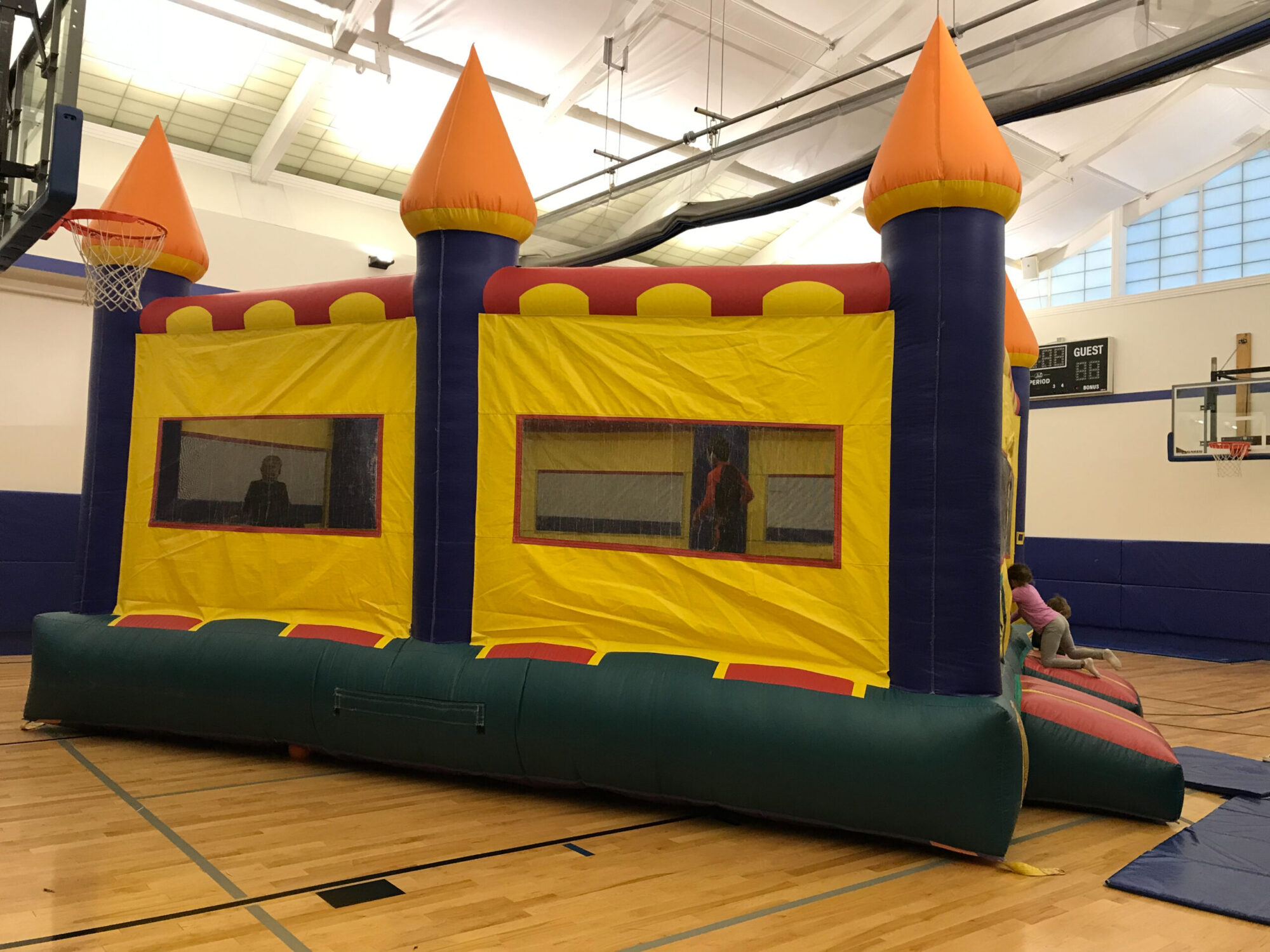 Kids enjoying bounce castle activities